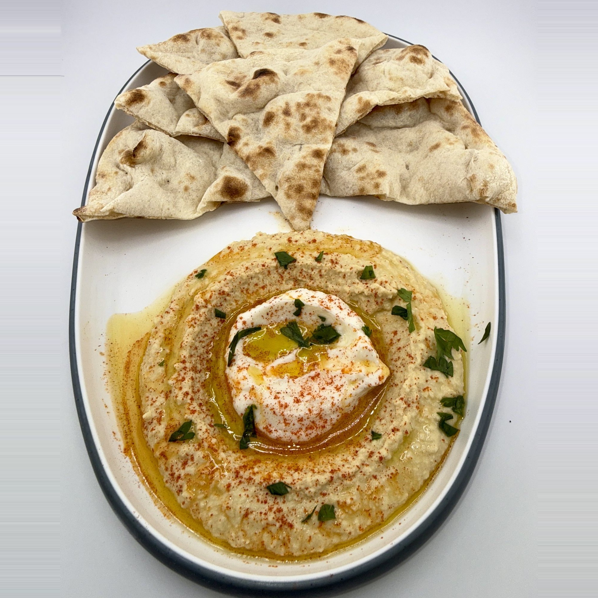 Garlic whip, hummus and Afghan nan